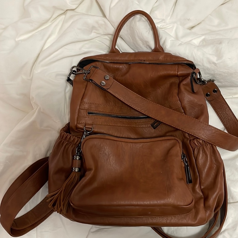 Backpack/purse with multiple pockets for all the essentials and more!
